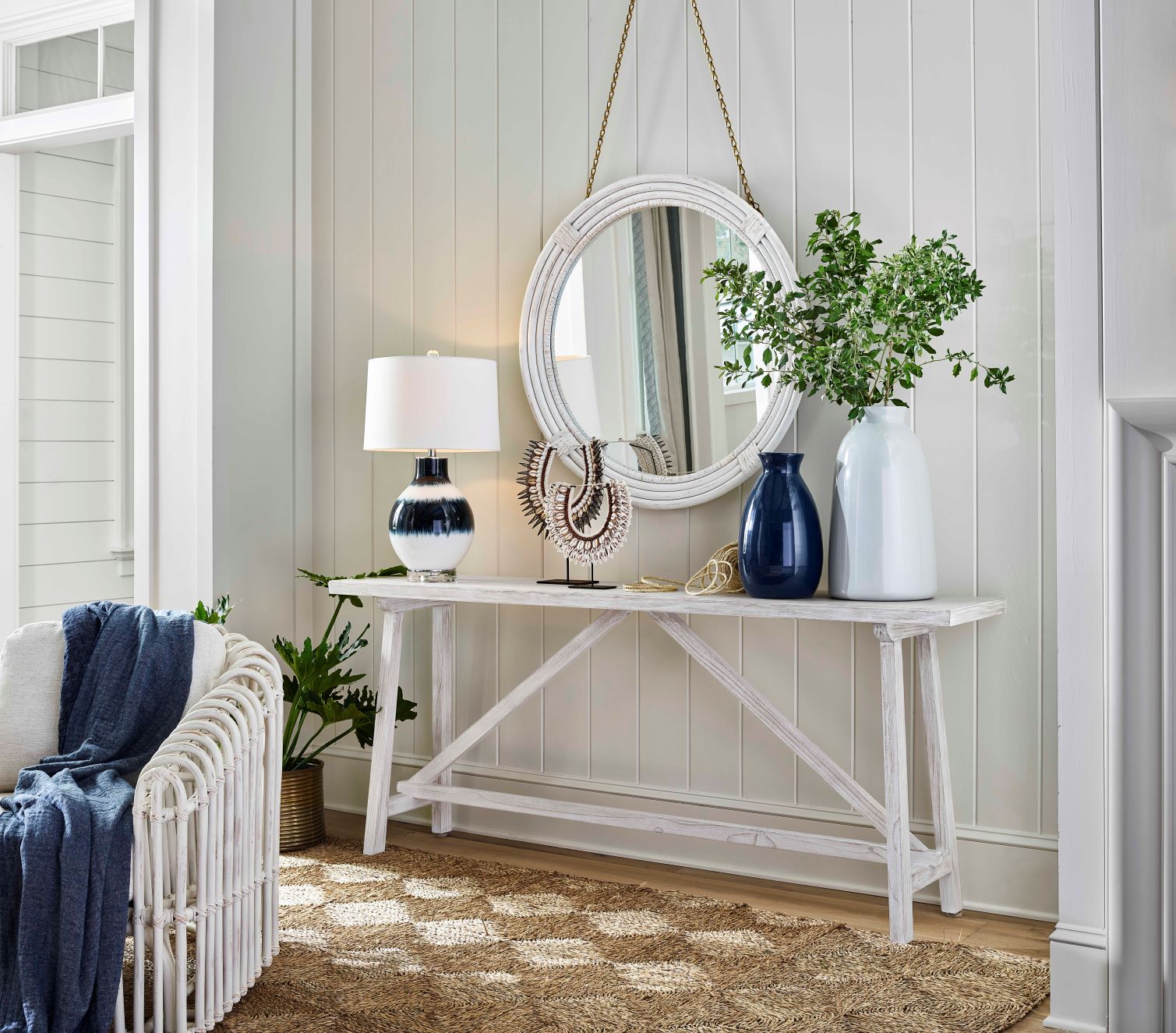 Console with lamp, pottery and mirror